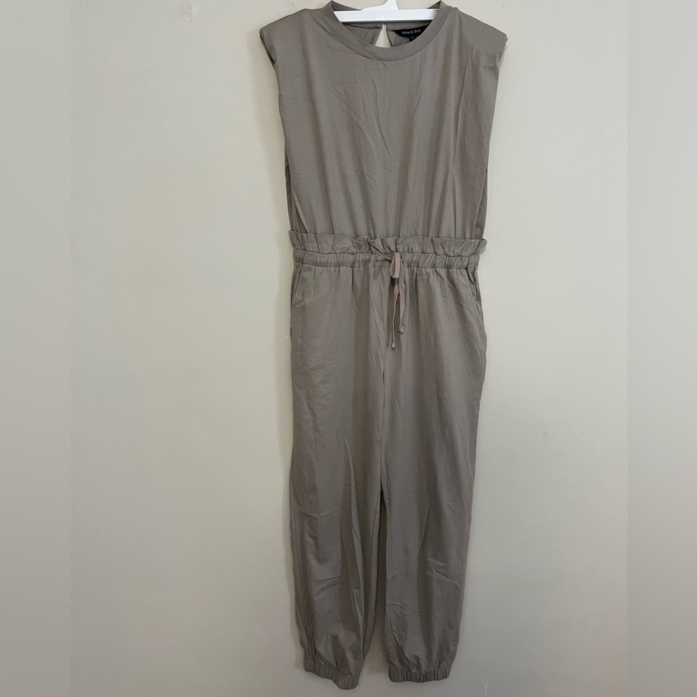 Strut and Bolt Jumpsuit with Shoulder Pads Taupe size large